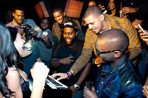 J_Cole_with_birthday_cake_at_LAVO