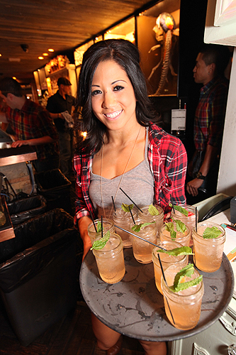 Server with signature cocktails