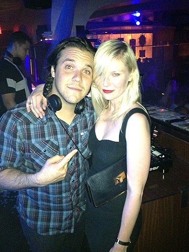 Kirsten_Dunst_and_DJ_DiJiTAL_in_Hyde_Bellagios_DJ_booth_Las_Vegas_5.18_-_low