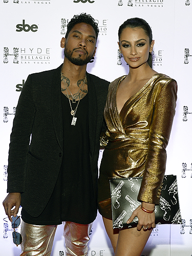 Miguel and girlfriend Nazanin Mandi pose on the red carpet at Hyde Bellagio Las Vegas 12.31.14