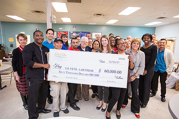 Team members from The Venetian and The Palazzo Las Vegas Present a 60000 check to U.S.VETS Courtesy The Venetian and The Palazzo Las Vegas