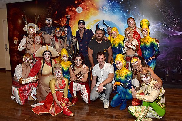 Jason Dohring and James Maslow pose with the cast of KÀ by Cirque du Soleil Aug. 24