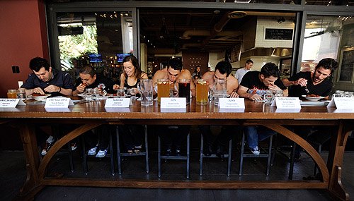 Marc Savard Saul Ortiz Mariah Rivera Jon Howes Juan DeAngelo Mark Shunock and JC Fernandez during meatball eating contest
