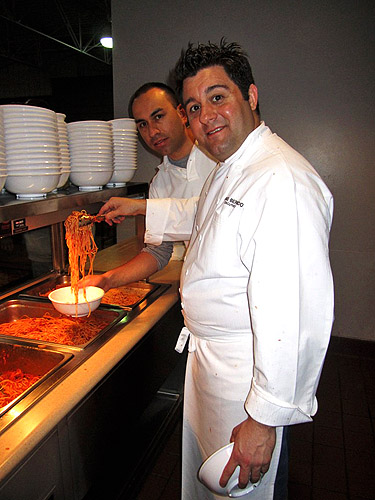 L-R_Servando_Daniels_and_Chef_Geno_Bernardo_at_Catholic_Charities_of_Southern_Nevada_-_credit_9_Group