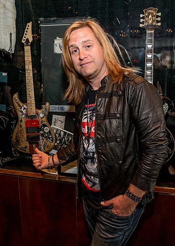 Andrew Freeman from RAIDING THE ROCK VAULT with Wood Graffiti Guitar Credit Erik Kabik