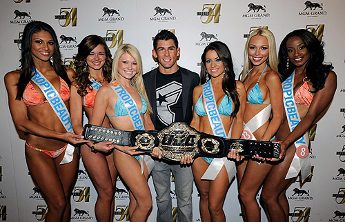 Dominick_Cruz_and_Tropic_Beauty_Model_Search_Contestants_on_Carpet_at_Studio_54_Las_Vegas_7.2.11