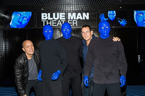 Blue_Man_Group_poses_with_founders_Chris_Wink_and_Phil_Stanton_after_skydive_stunt_photo_credit_Erik_Kabik_lowres