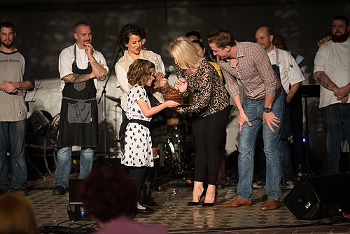 Emma Thurgood is presented with Harry Potter themed cupcake specially designed by local bakery Cupkates Credit Andrew James
