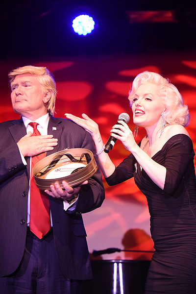 Photo 1 l to r Marcel Forestieri as Donald Trump wins 2017 Newshound Reel Award while Suzie Kennedy as Marilyn Monroe looks on Photo by Allen Dye Photography