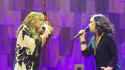Jennifer Nettles on stage with Brandy Clark